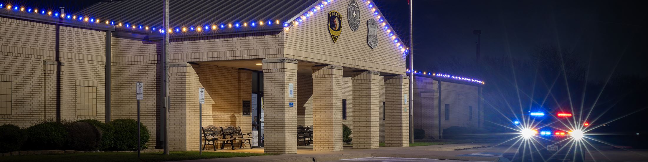 Home Slideshow Banner Police Car Christmas at Night