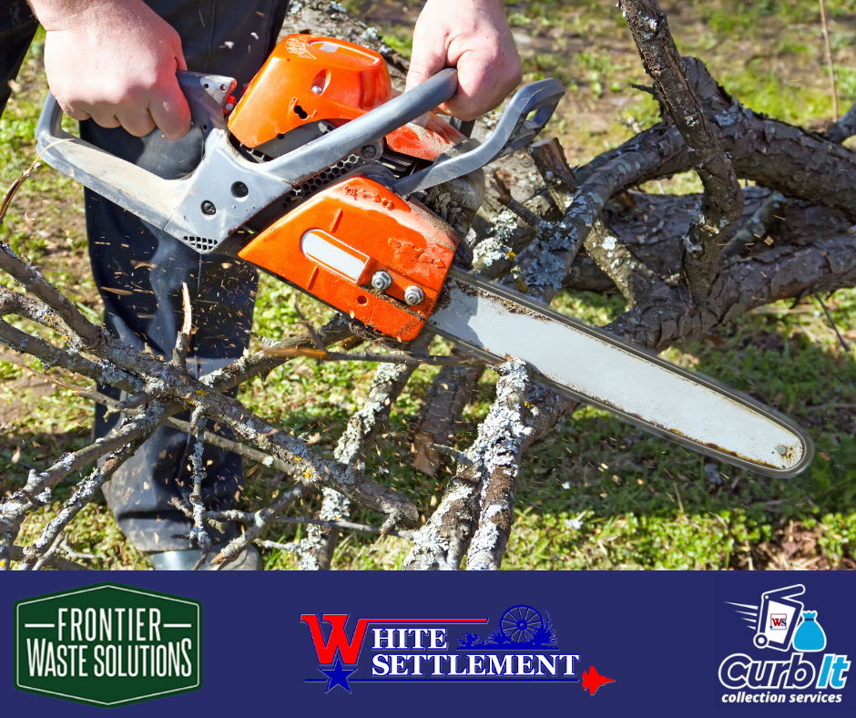 a chainsaw cutting through a tree limb